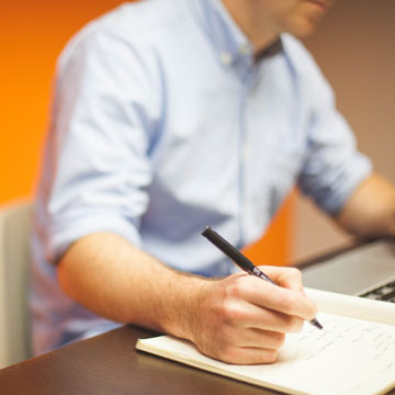 Photo of pencil and notebook