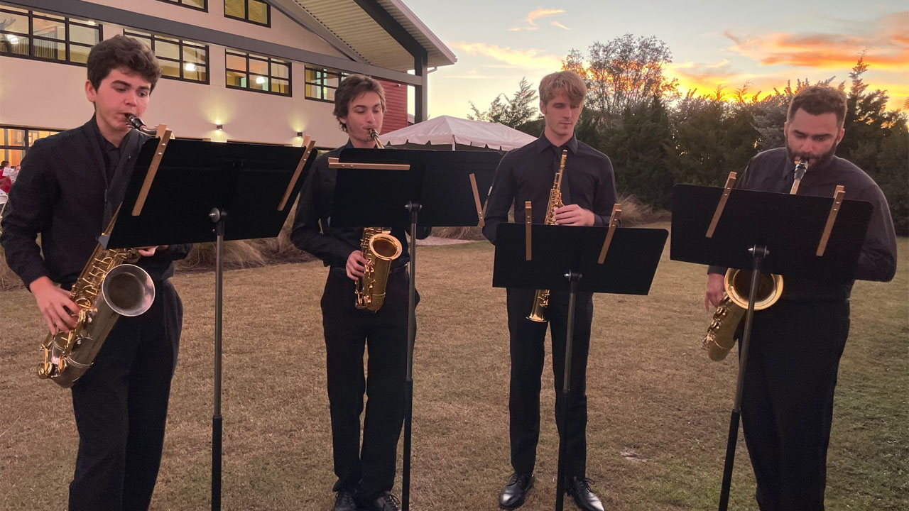 Sax quartet at sunset Sax quartet at sunset