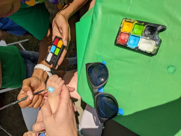 Hand-painting at FGCU Day