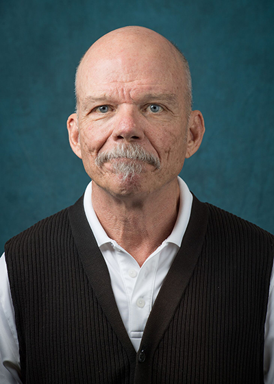 Dr. Mark Simpson