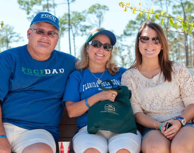 family on bench at fgcu