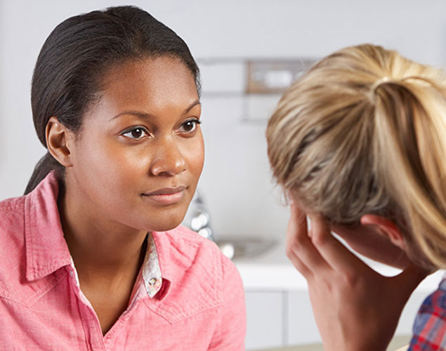 Counselor talking to patient