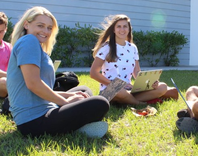 Entrepreneurship students working outside