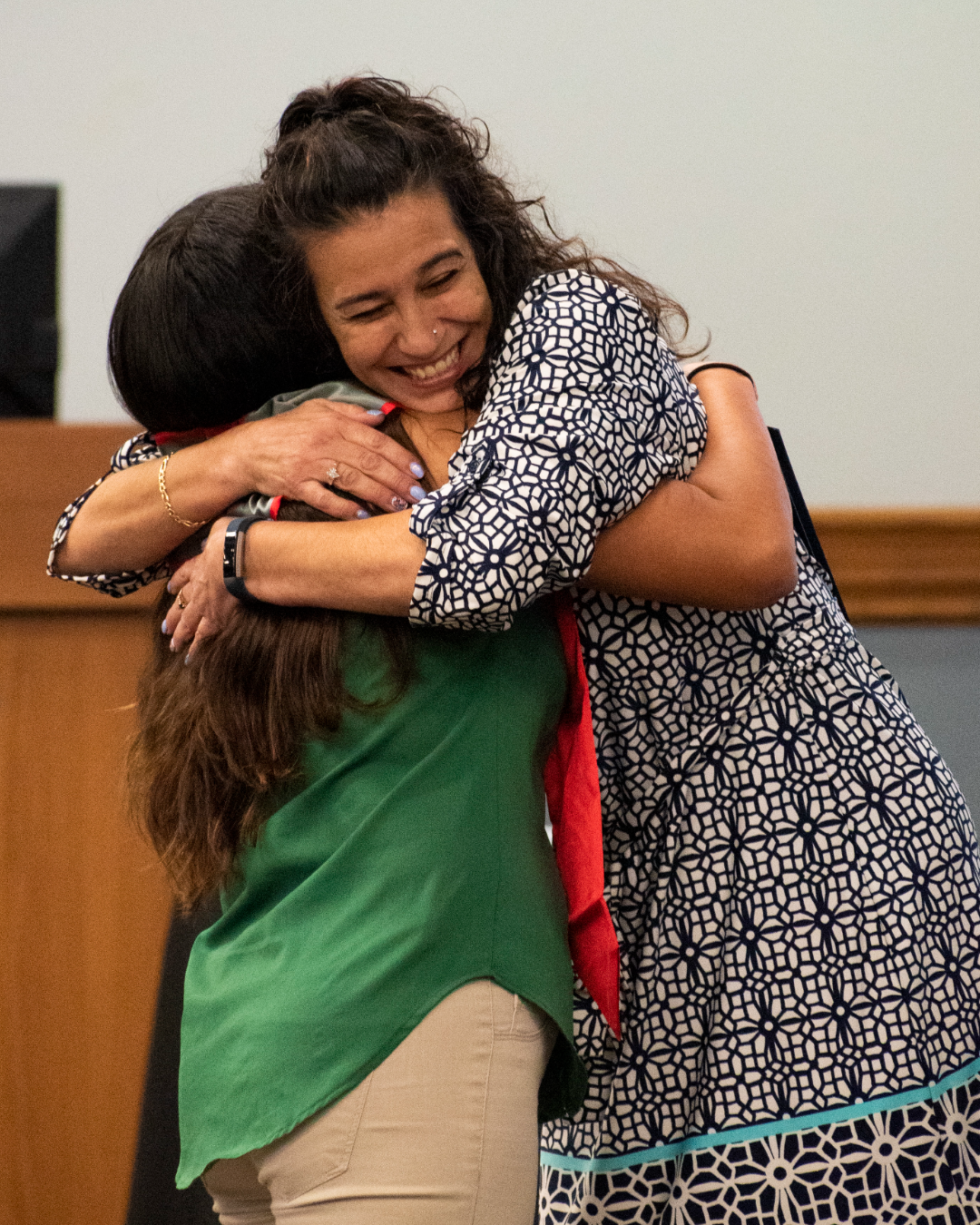 picture of students hugging
